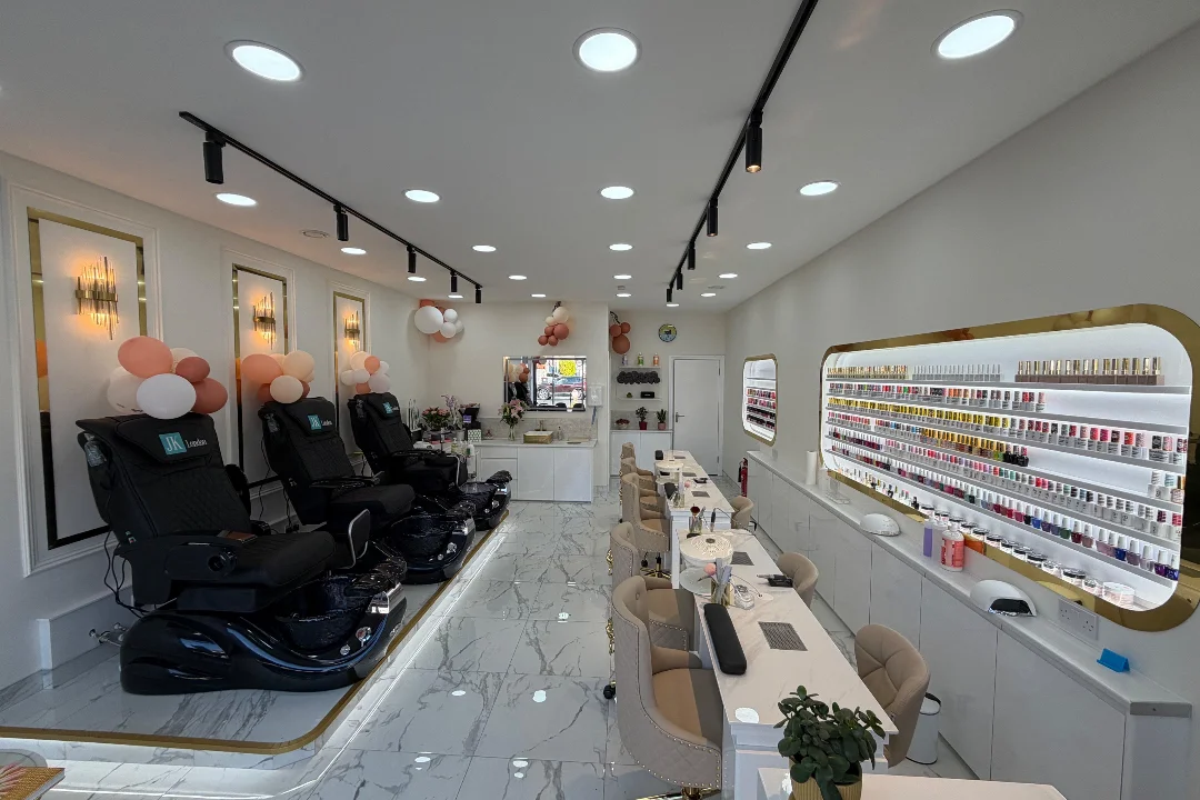 Manicure stations and pedicure chairs inside JB Nails