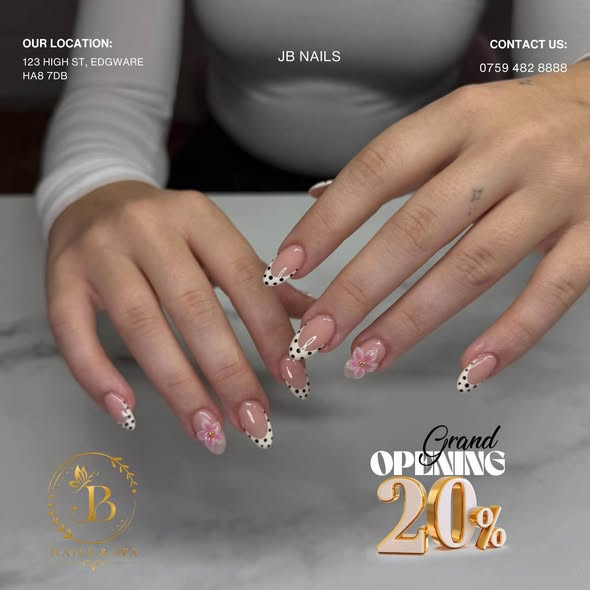 Floral nail art with a French tip created at JB Nails